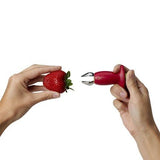 Chefn StemGem Strawberry Huller demonstrating pulling the hull out of a strawberry