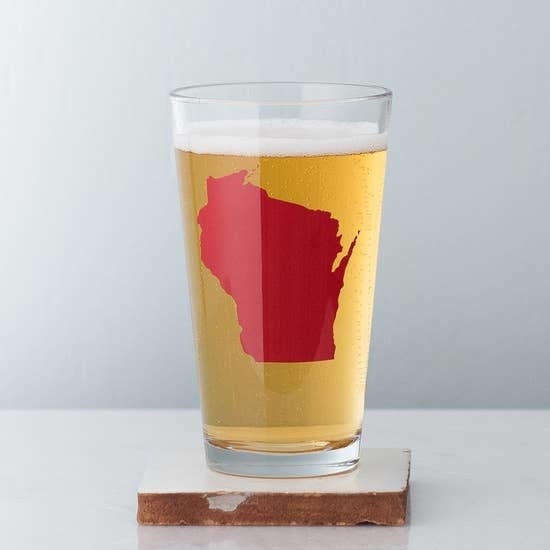 Vital Industries Wisconsin Pint Glass with Red state of Wisconsin on it