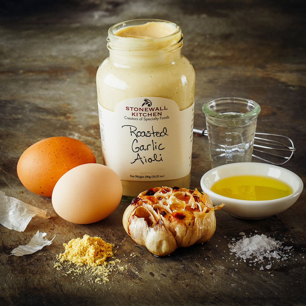 Jar of Stonewall Kitchen Roasted Garlic Aioli with ingredients that make the sauce