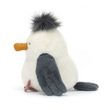 Plush toy sea gull with gray wings and a white body on a white background