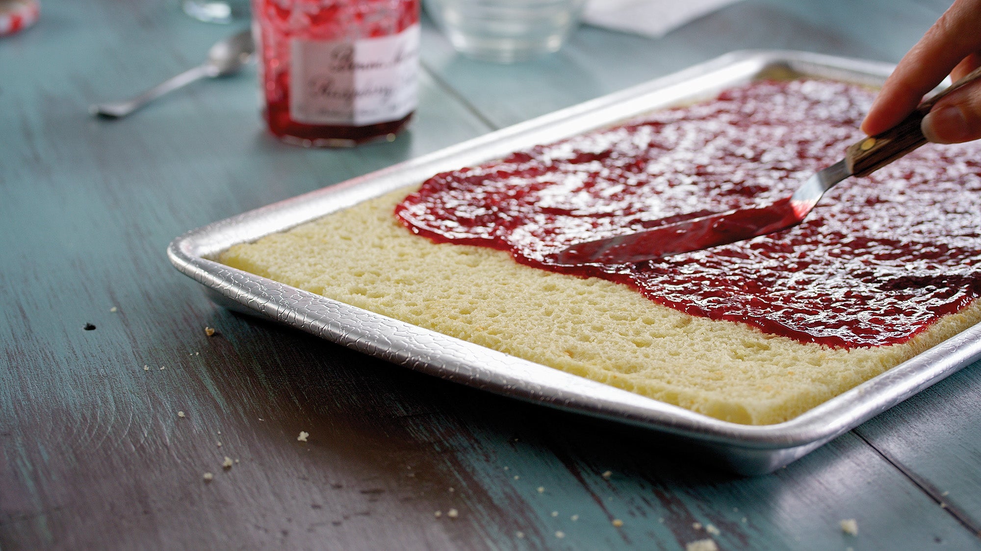 Doughmakers Jelly Roll Pan with someone preparing a jelly roll