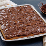 Doughmakers Sheet Cake Pan with sheet cake in it