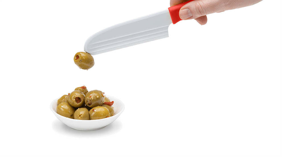 Dreamfarm Cheeseknife Knibble picking up an olive