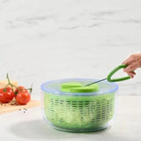 Zyliss Easy Spin Salad Spinner with easy pull top and salad ingredients in spinner