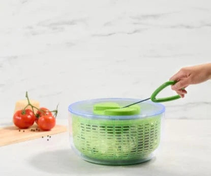 Zyliss Easy Spin Salad Spinner with easy pull top and salad ingredients in spinner