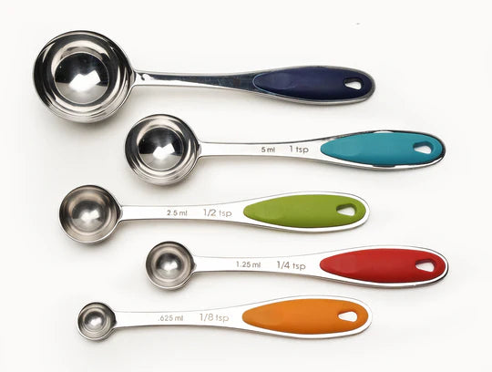 Set of stainless steel measuring spoons with colored handles includes: 1 Tbsp, 1 tsp, 1/2 tsp, 1/4 tsp, and 1/8 tsp
