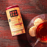 Picture Republic of Tea Ginger Peach Red Tea Can with cookies and a cup of tea