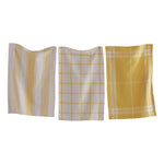 One yellow and white stripe, one yellow and white checkered, and one yellow and white plaid check
