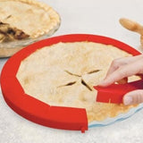 Talisman  Adjustable Pie Shield  showing how it protects a pie crust.