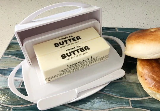 White Butterie Butter Dish holding two sticks of butter