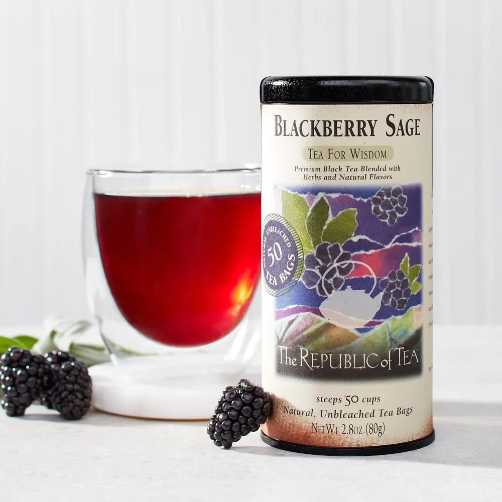 Picture of a can of Republic of Tea Blackberry Sage Tea Can with a cup of tea and blackberries