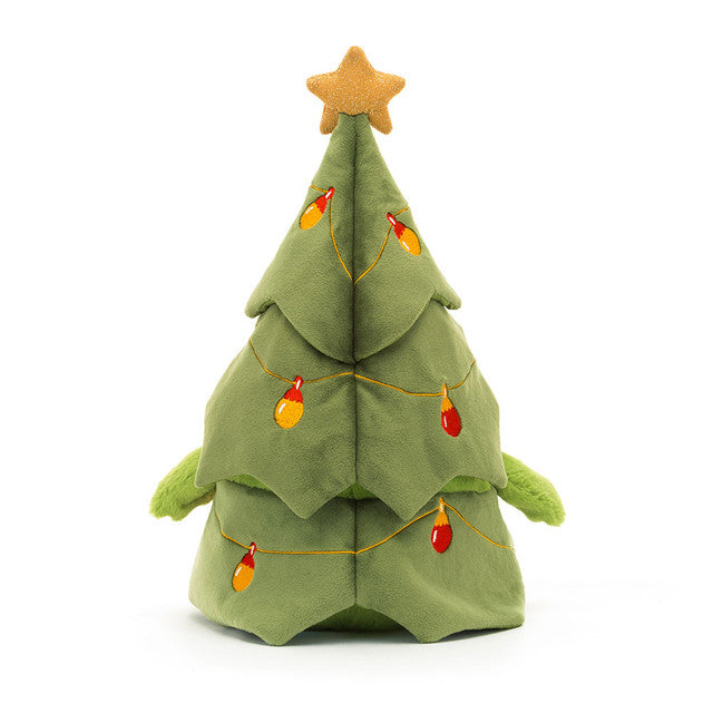 Backside view of Plush toy frog with a grumpy face dressed as a Christmas tree with lights and a star on a white background