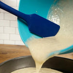 Blue Silicone Spatula - scooping out batter