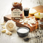 Garlic and Onion Jam with garlic bulb, onion, salt  on cutting board