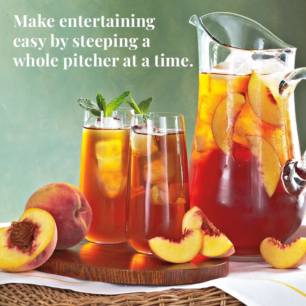 Make entertaining easy by steeping a whole pitcher at a time, Ginger peach pitcher or ice tea, two glasses of tea, and peach slices