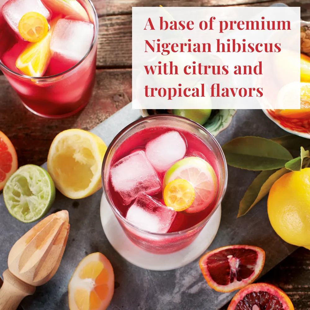 Republic of Tea's Hibiscus Sangria A base of Premium Nigerian hibiscus with citrus and tropical flavors -a glass of ice tea, and fruit