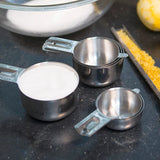 Stainless Steel Measuring Cups on counter with ingredients