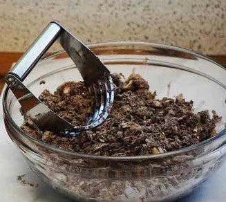 Pastry blender blending dough