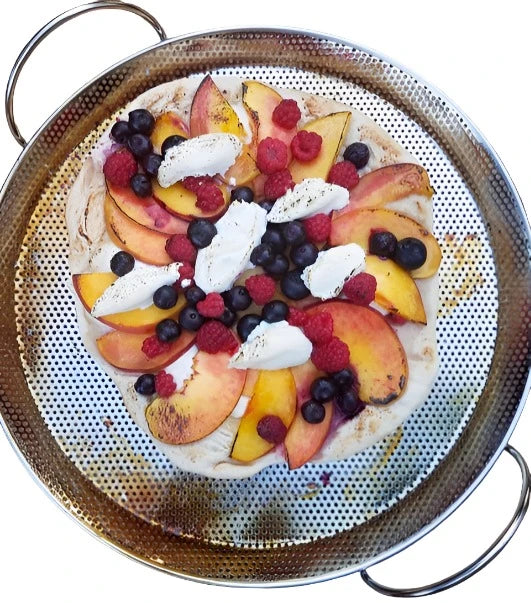 Top view of pizza pan with fruit