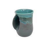 Clay In Motion Handwarmer Mug