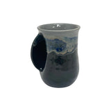 Clay In Motion Handwarmer Mug