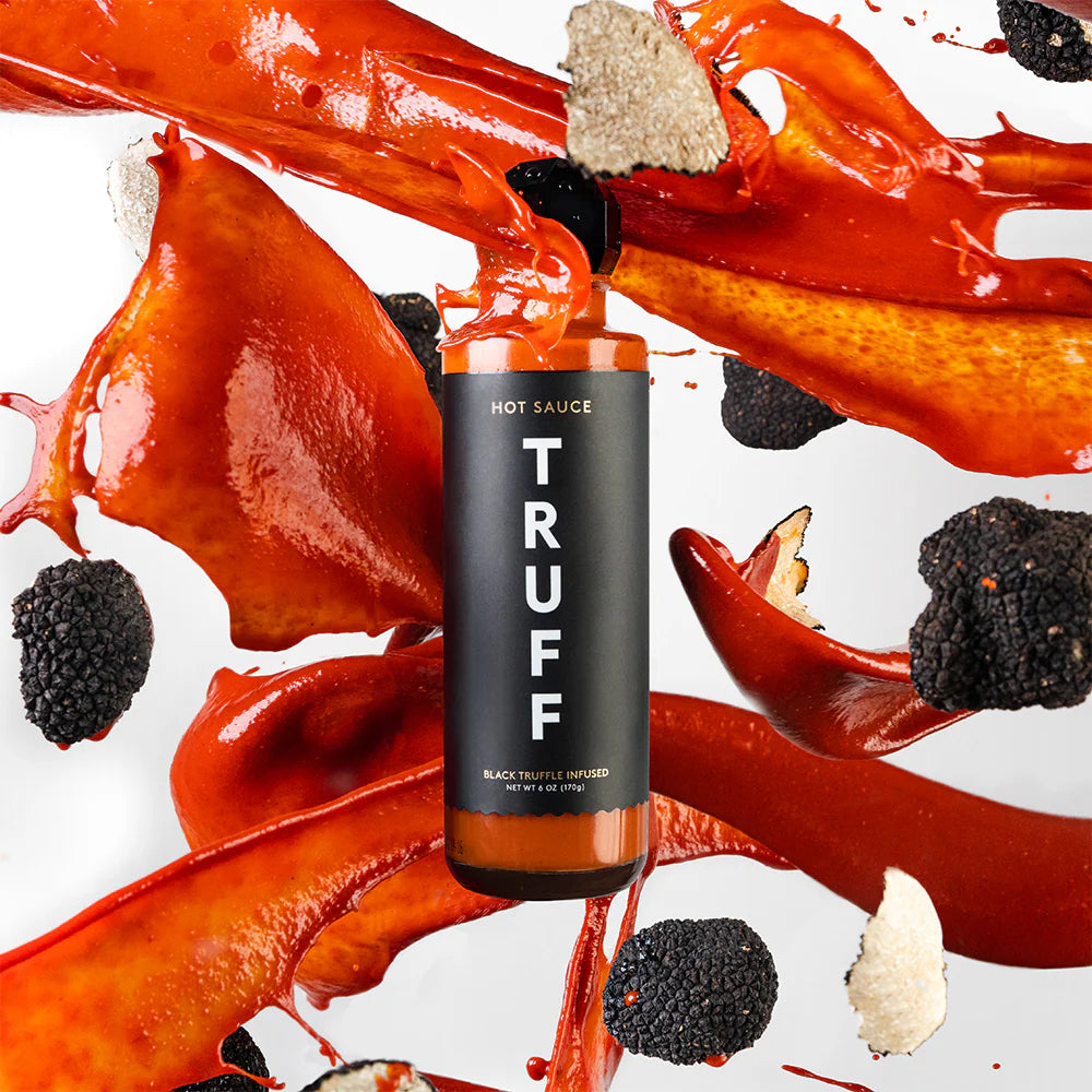 Truff Hot Sauce with ingredients, red sauce, and truffles 