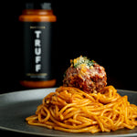 Truff Marinara on pasta and a meatball