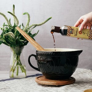 Pouring Blue Cattle Vanilla in a mixing bowl
