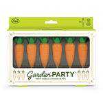 Packaging of 'Garden Party' carrot-shaped candles with a green and white design.
