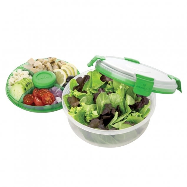 Progressive salad container.  Bowl with  stackable, divided container  and separate dressing container with lid