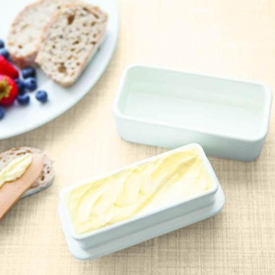 Talisman Butter Keeper with Butter and bread and fruit