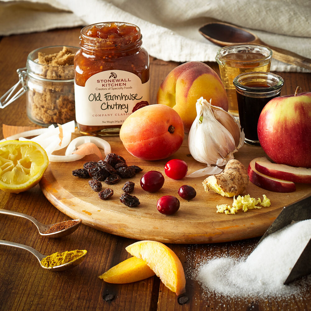 Stonewall Kitchen Chutney Farmhouse on a board with fruits