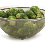 colander and Brussels sprouts