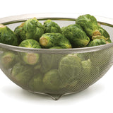 colander and Brussels sprouts