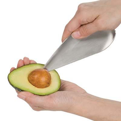 Trudeau Avocado Tool taking out pit of avocado