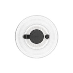 Round white salad spinner top with black center on a white background