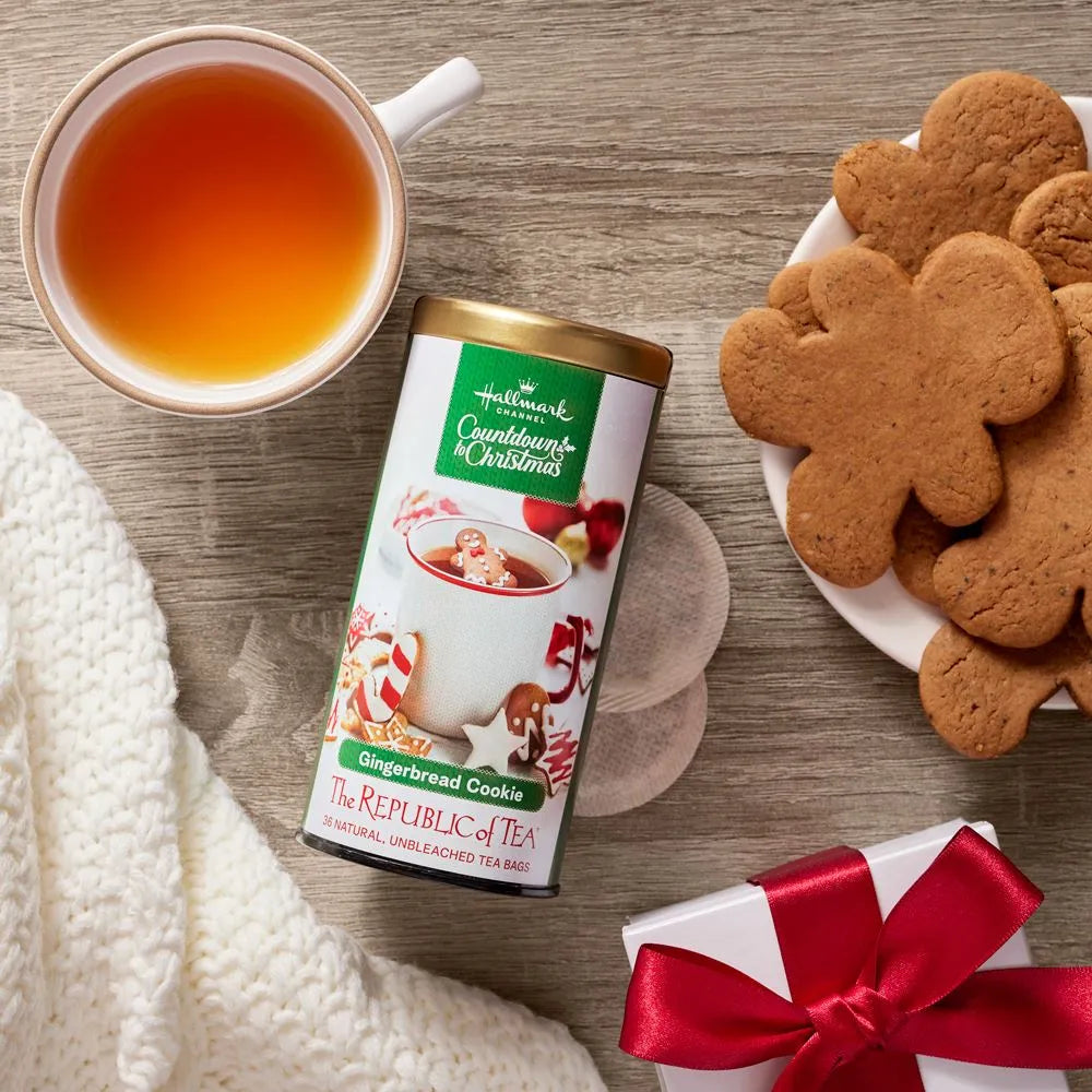  Picture Republic of Tea Gingerbread Cookie Tea Can,  Tea bags, a cup of Tea, Gingerbread Cookies, a gift with a red bow