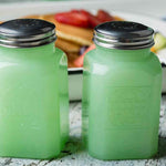 Jadeite Salt and Pepper shaker in front of a meal