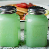 Jadeite Salt and Pepper shaker in front of a meal