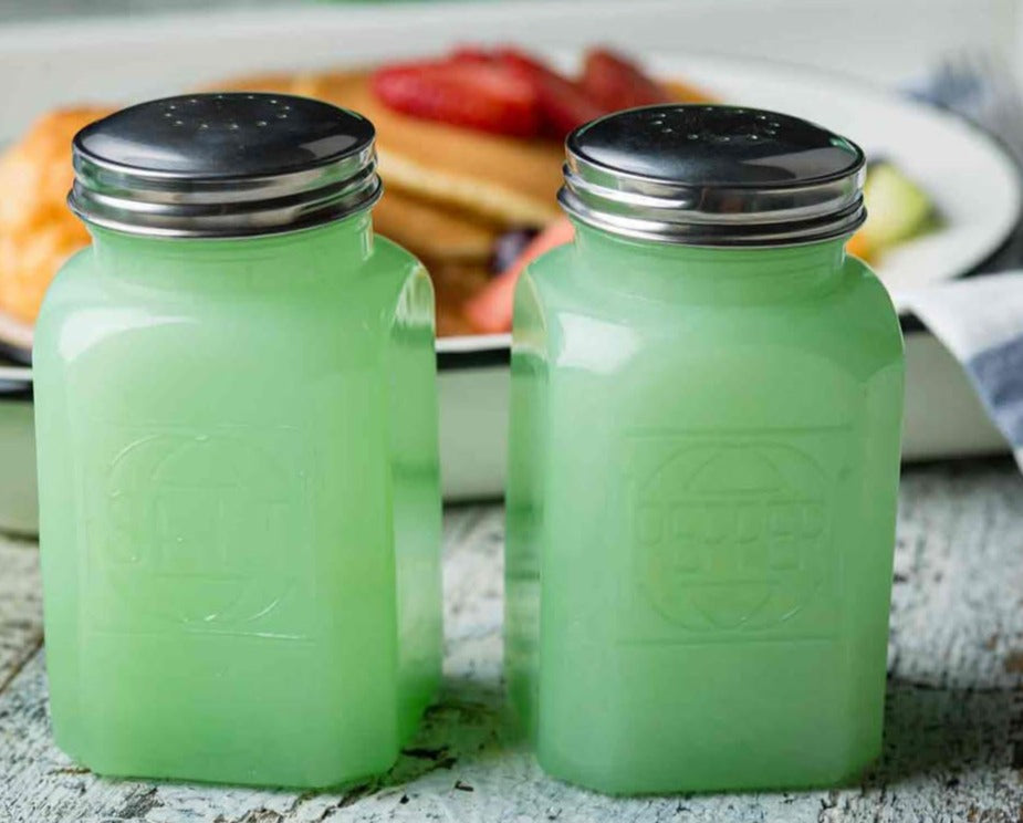 Jadeite Salt and Pepper shaker in front of a meal