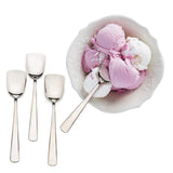 Three ice cream spoons with a  spoon in dish of ice cream