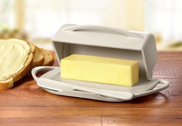 Ivory Butterie Butter Dish with butter in it