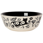 Decorative bowl with black floral and cat design on a white background