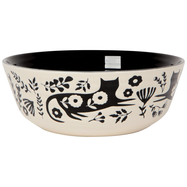 Decorative bowl with black floral and cat design on a white background