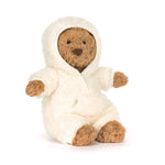 Stuffed animal in a white hooded outfit on a white background