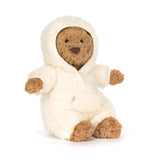 Stuffed animal in a white hooded outfit on a white background