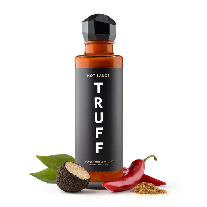 Bottle of Turff Hot suace with chlii pepper, truffle, and spices