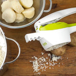 Potato ricer with bits of potato