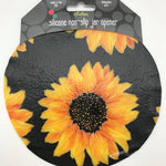 Andreas Jar Opener black background with bright sunflowers
