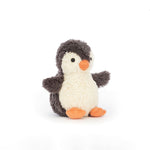 Stuffed penguin on a white background